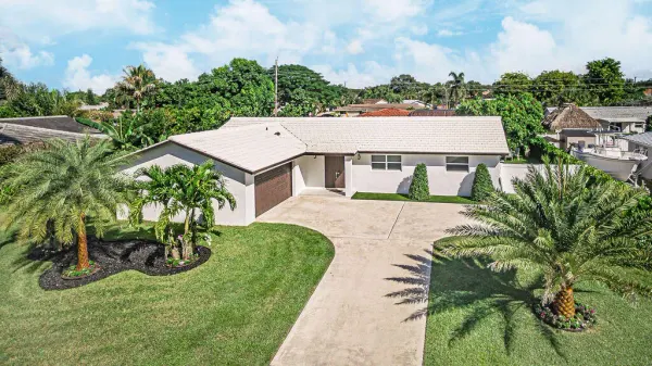 1881 Caribbean Road W, Lake Clarke Shores, FL 33406